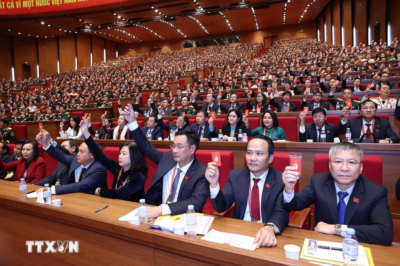 Đại hội biểu quyết thông qua số lượng Ủy viên Ban Chấp hành Trung ương Đảng khóa XIV. (Ảnh: TTXVN) ttxvn-dai-hoi-xiv-cua-dang-bau-ban-chap-hanh-trung-uong-khoa-xiv-8546126-4.jpg