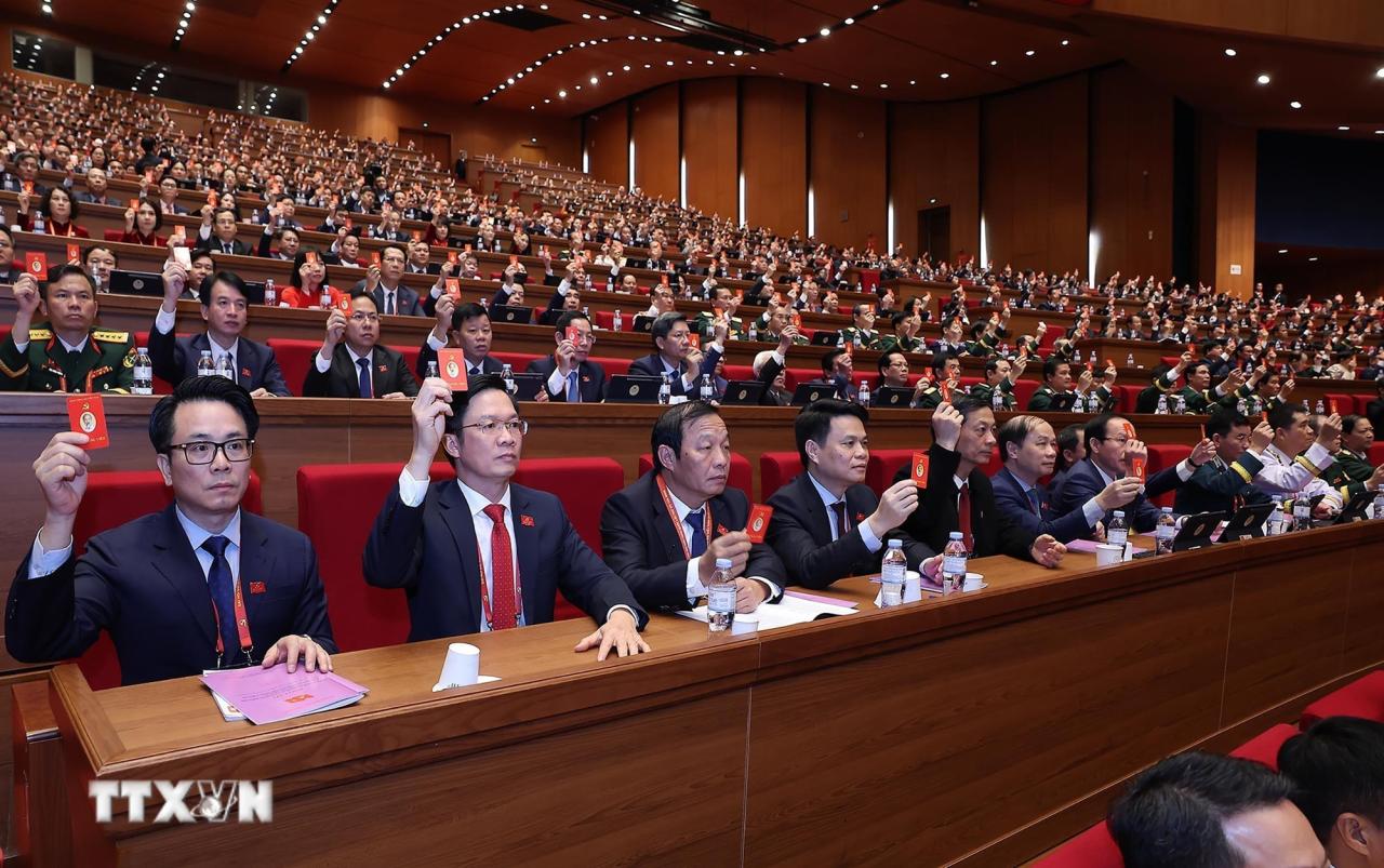 Đại hội biểu quyết thông qua số lượng Ủy viên Ban Chấp hành Trung ương Đảng khóa XIV. (Ảnh: TTXVN) ttxvn-dai-hoi-xiv-cua-dang-bau-ban-chap-hanh-trung-uong-khoa-xiv-8546136-9.jpg